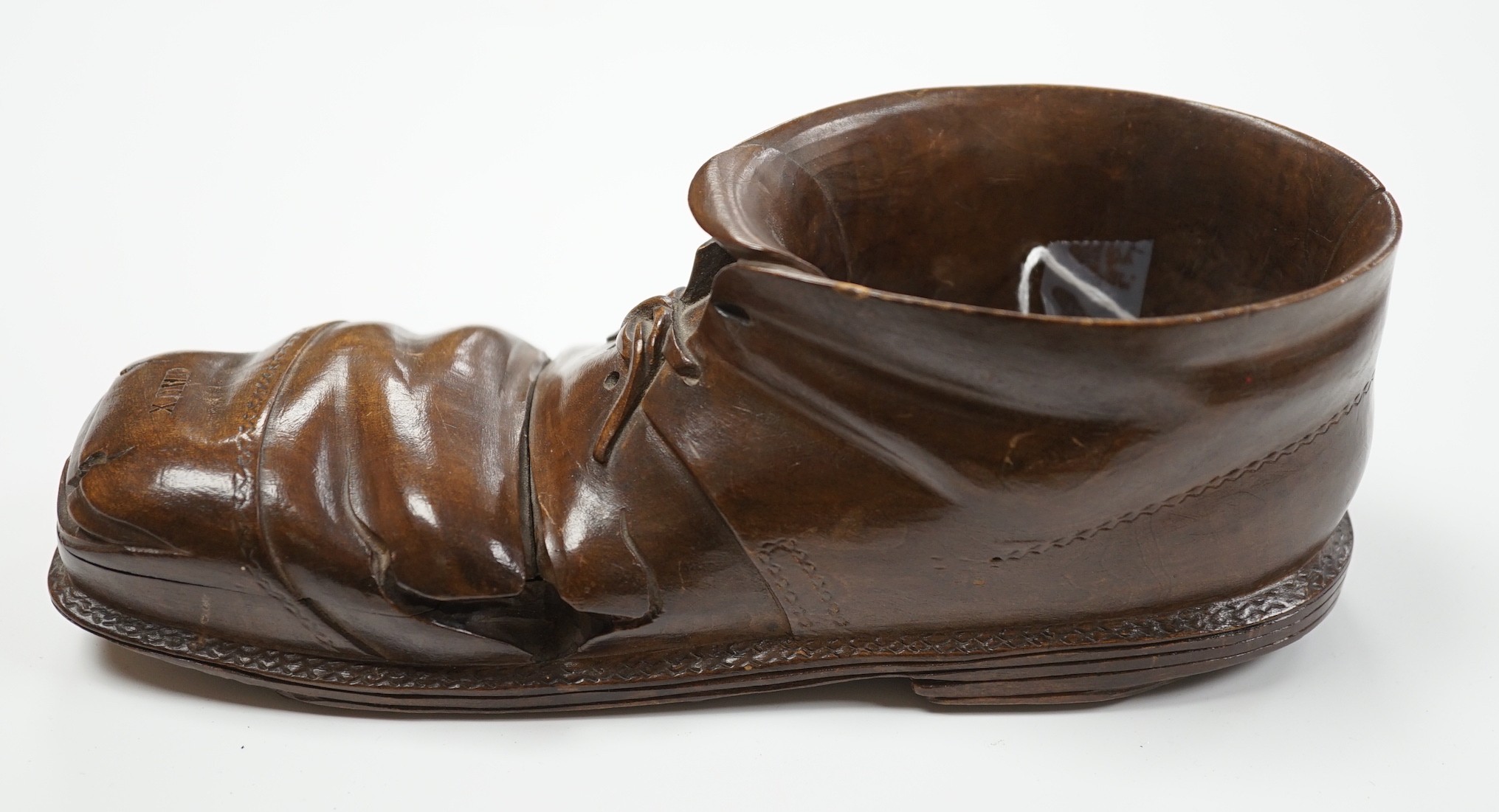 A Swiss Caux treen 'boot' vesta case, 22cm long